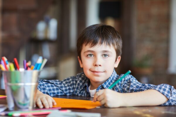 Boy Drawing Pictures