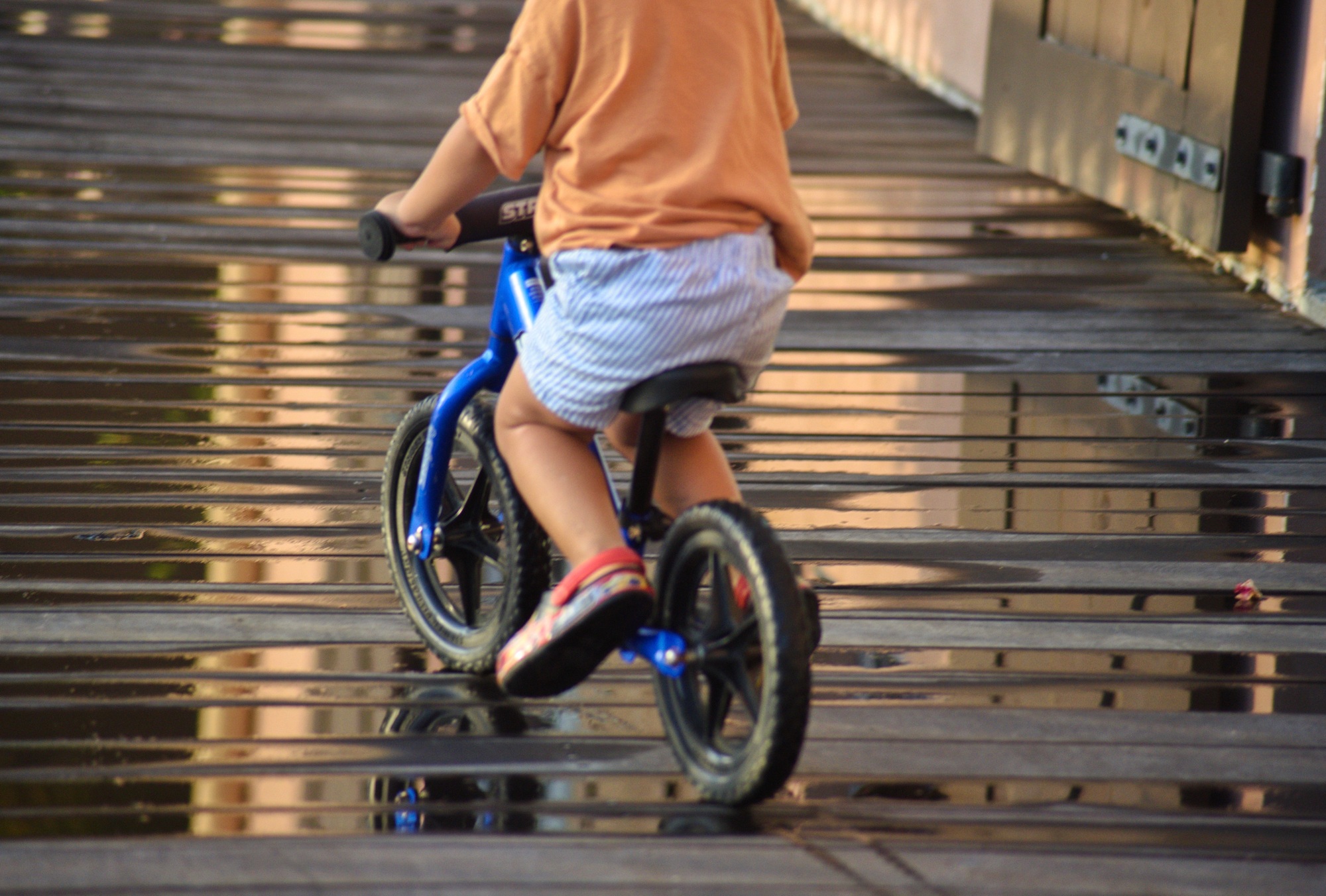 Child rides a bike