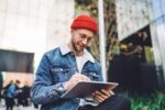 Modern male drawing on graphic tablet