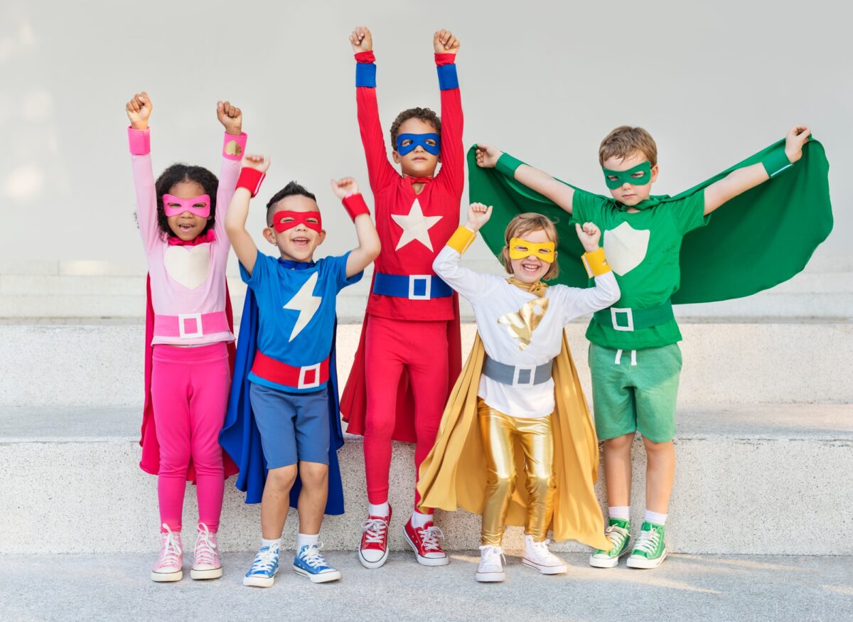 Superheroes Cheerful Kids Expressing Positivity Concept