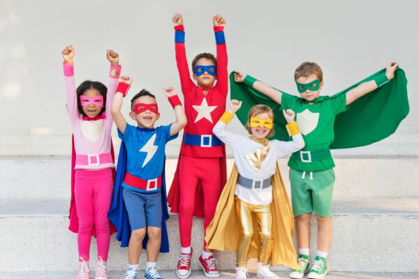 Superheroes Cheerful Kids Expressing Positivity Concept